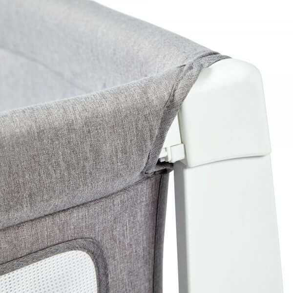 Shnuggle Air Cot Conversion Kit in Dove Grey, featuring a soft fabric edge and sturdy white frame for nursery use.