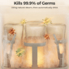Momcozy KleanPal Pro Baby Bottle Washer sterilizing bottles with steam, showcasing its germ-killing feature in action.