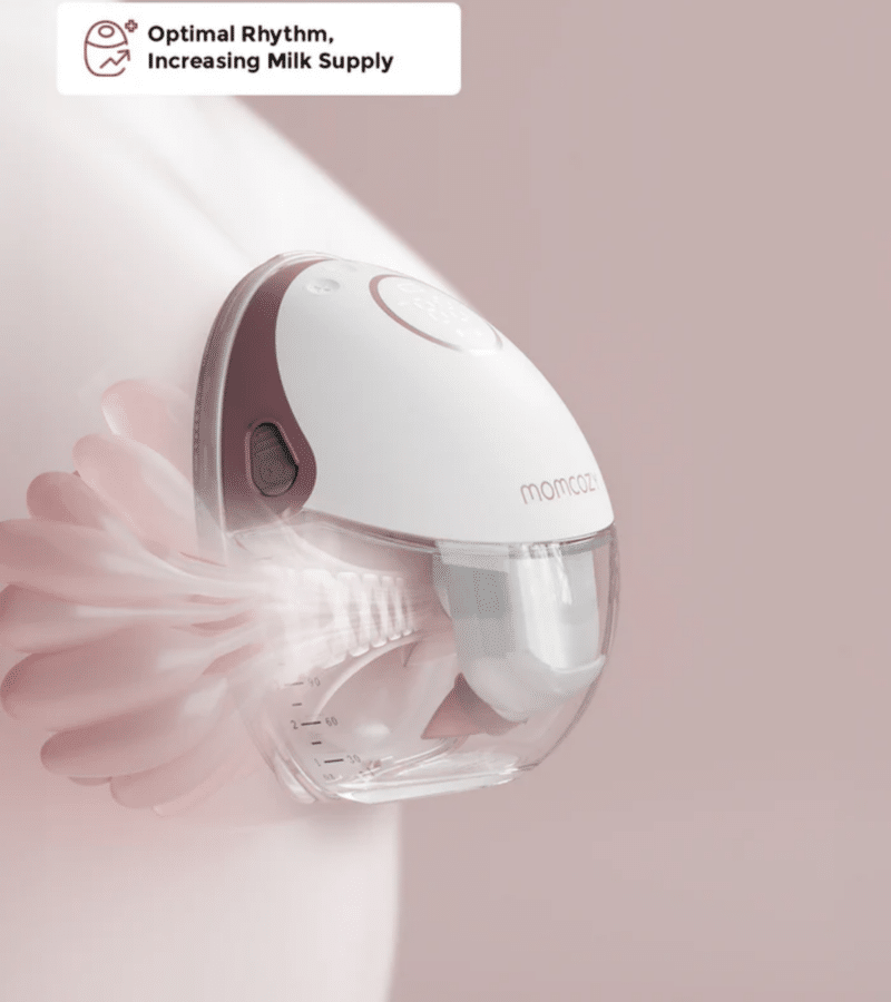 Momcozy M6 Single Wearable Hands Free Breast Pump in grey and red, showcasing suction detail for optimal milk supply.