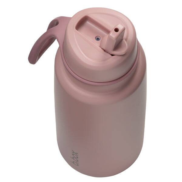 b.box 1L insulated water bottle in berry smoothie with a flip top lid, showcasing a sleek design and easy-to-use spout.