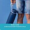 b.box 1L insulated water bottle in midnight with a flexible handle for easy carrying, shown in a lifestyle context.