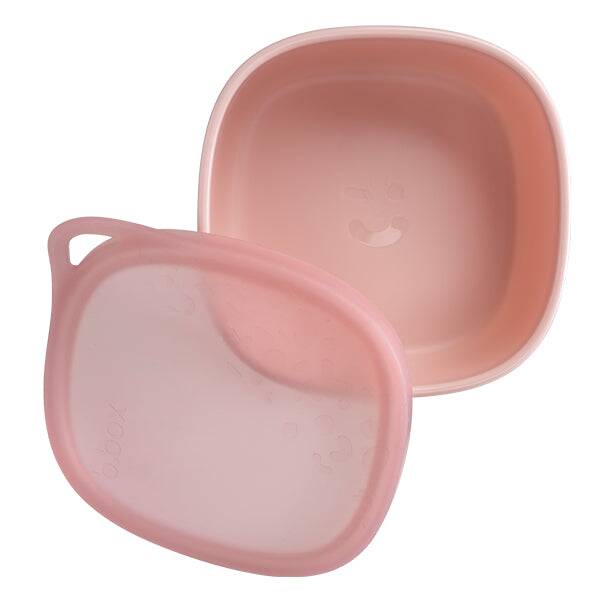 b.box lunch tub in berry smoothie color with a smiling face design, featuring a matching lid, ideal for on-the-go meals.
