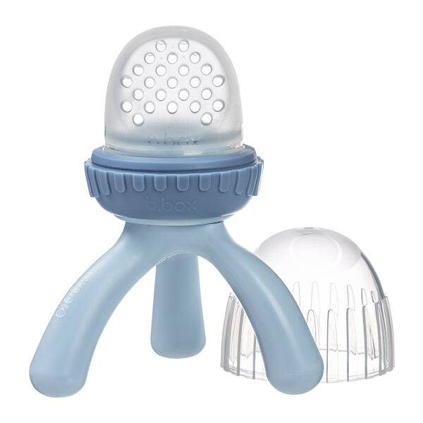 b.box Silicone Fresh Food Feeder in lullaby blue with a textured feeding top and a removable cap for easy cleaning.